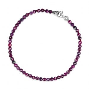 “Ruby Gemstone Bracelet with faceted pinky-red rubies and precious metal clasp.”