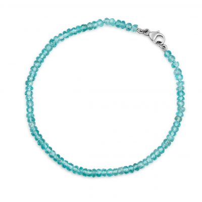 “Blue Apatite Gemstone Bracelet with faceted blue apatite beads and precious metal clasp.”