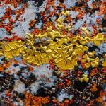 kata-pari-aazami-fire-stillness-ii-detail.jpg “And The Fire That Grows Between The Stillness II by Pari Aazami — mixed-media artwork with silver leaf, deep reds, greys, and yellow highlights.”