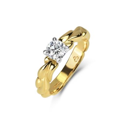 KATA Woven Bark diamond ring featuring a sparkling diamond and textured woven band in 18ct yellow gold.